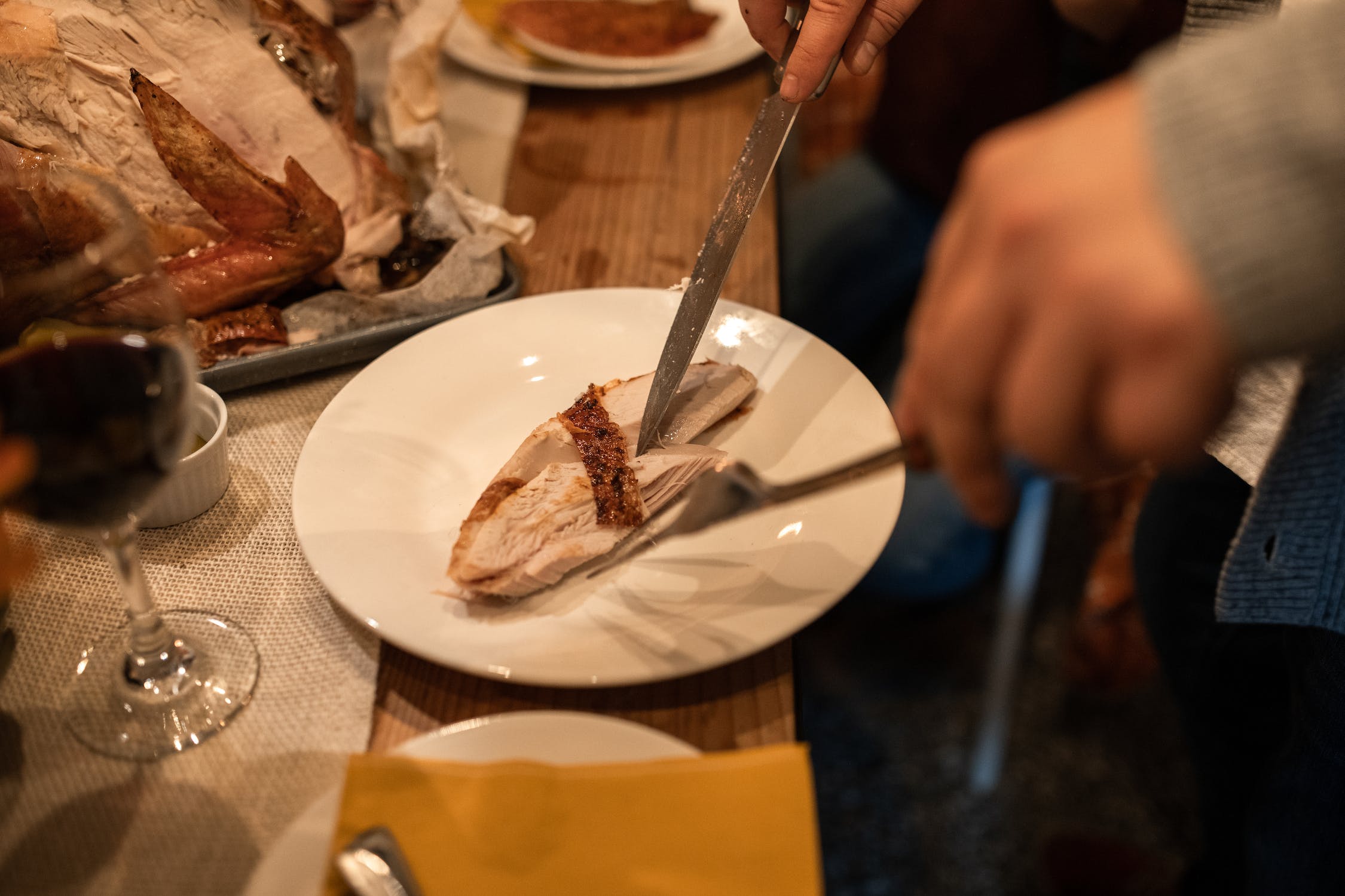 cutting cooked turkey