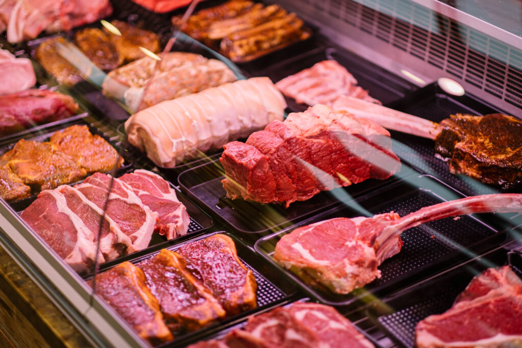Selection of beef and pork cuts on display at Basecamp North Lakes butcher counter